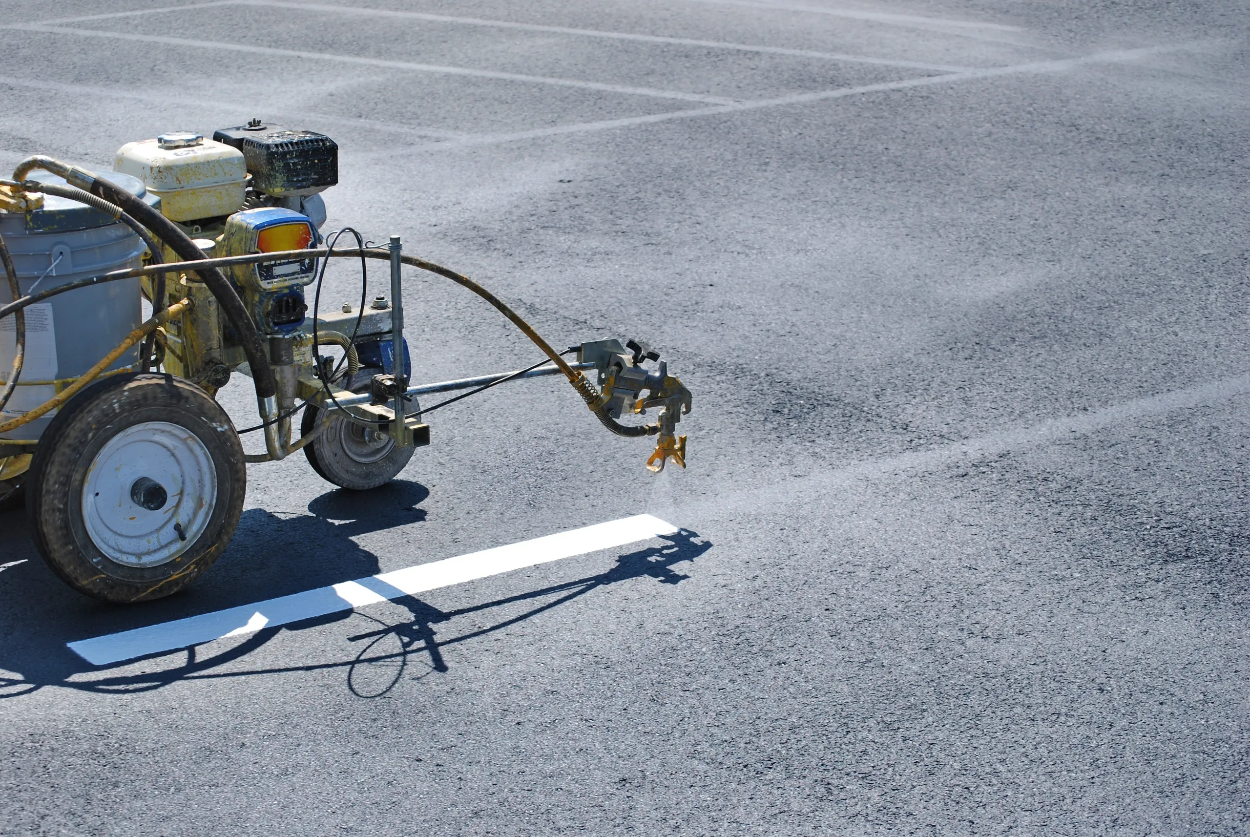 Close-up parking lot striping machine
